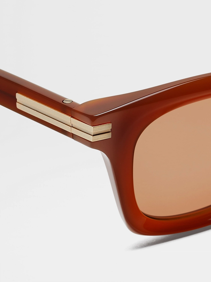 Sonnenbrille aus Acetat mit dunklem Laub Sonnenbrille aus Acetat mit dunklem Laub