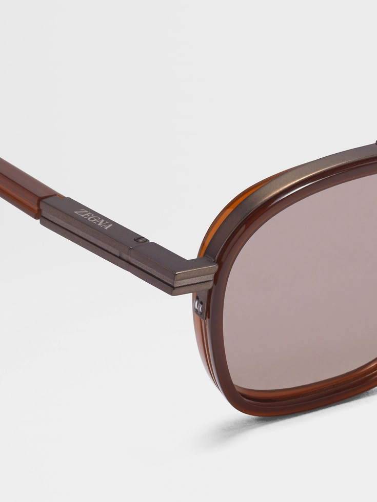 Sonnenbrille „Orizzonte I“ aus Acetat und Metall in dunklem Laub